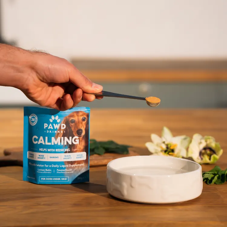 A scoop of PAWD calming powder